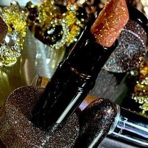 MAC Gold Star Kiss of Stars Lipstick    One color and one lipstick. Gold Star